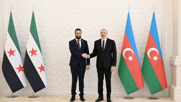İlham Əliyevin Suriyanın keçid dövrü Prezidenti ilə geniş tərkibdə görüşü olub - FOTO