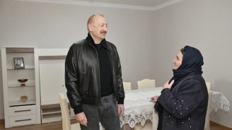 Prezident Ağdərənin Çapar kəndindəki ailənin qonağı oldu - VİDEO