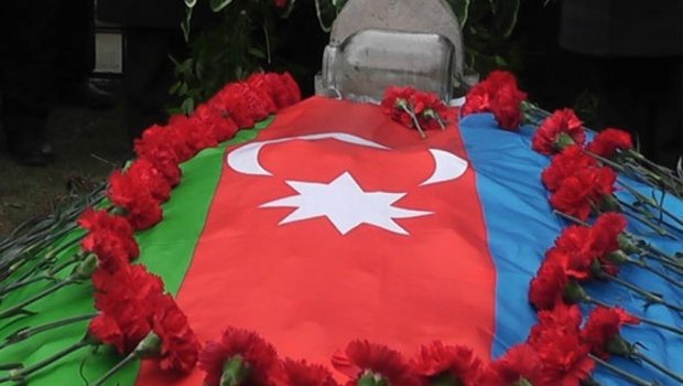 18 şəhidin məzarı Yasamaldakı Şəhidlər Xiyabanına köçürüldü - FOTO