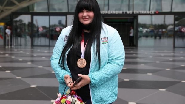 Tokioda bürünc medal qazanan cüdoçumuz Bakıya gəldi - FOTO