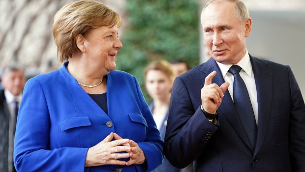 Merkel Putinlə bağlı yeni sirri açdı