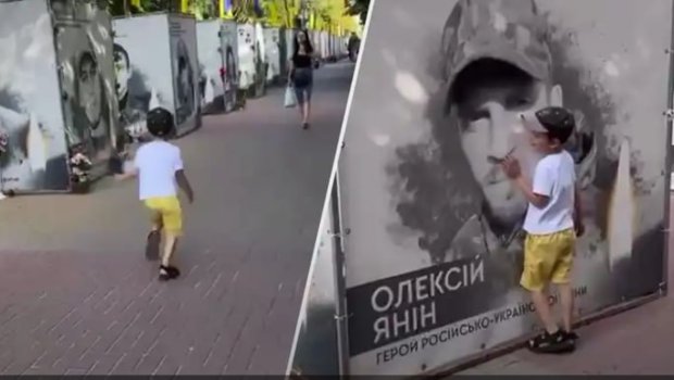 Müharibədə ölən atasının pankartını görən ukraynalı uşağın DUYĞUSAL ANLARI - FOTO/VİDEO