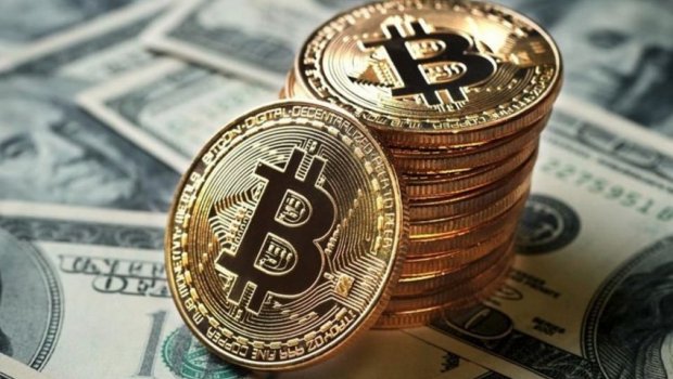 Bitkoindən tarixi rekord: Qiyməti 70 mini ötdü