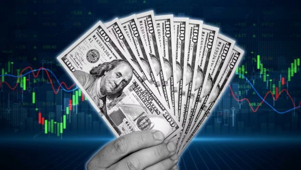 KİV: Dollar investorlar üçün təhlükəsiz sığınacaq kimi görünmür
