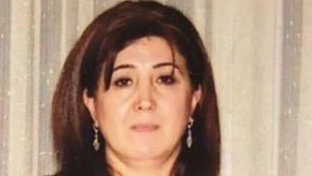 Məmur ərini qarajda öldürən qadının cəzası azaldıldı