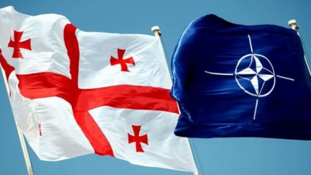 Britaniya NATO-ya girmək istəyən Gürcüstanın gözünü Rusiya ilə qorxudur