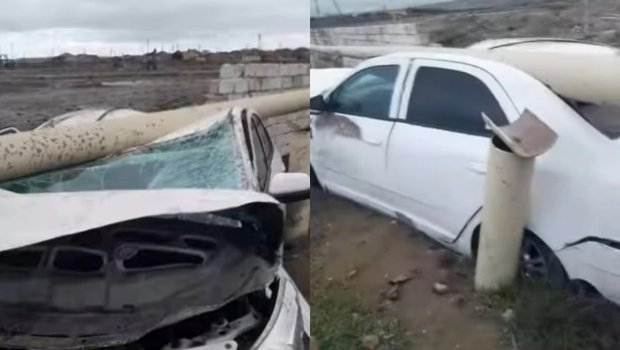 Bakıda minik avtomobili yol kənarındakı maneəyə çırpıldı - VİDEO