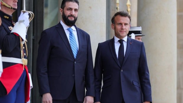 Makron suriyalı həmkarı ilə telefonla danışdı