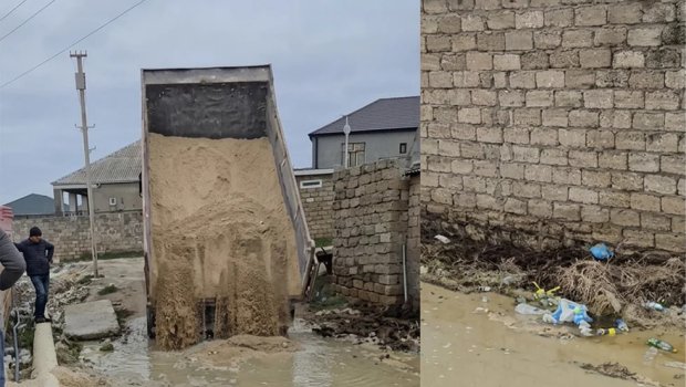 Xəzər rayonunda küçəni çirkab su basdı - VİDEO