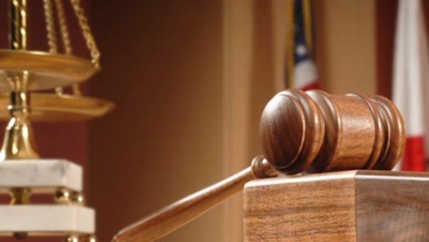 Ərini qətlə yetirən qadının məhkəməsi: "Oğlumu öldürdüyünü gizlədib"