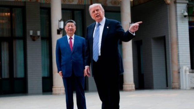 Tramp Çin liderinə Amerika silahları almağı təklif etdi